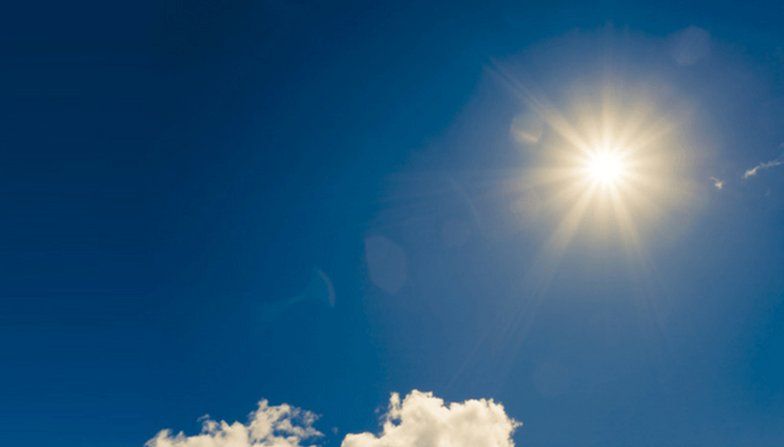 Image of sun in blue sky