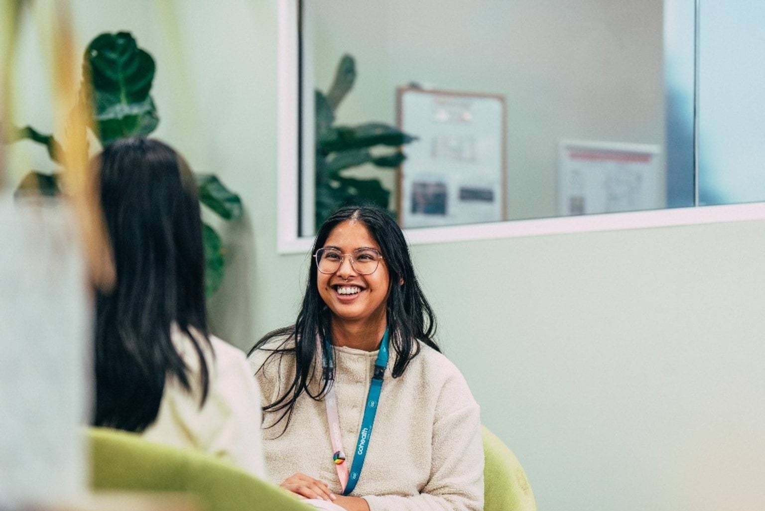 Our next phase of mental health and wellbeing reform A patient and a health professional sit talking