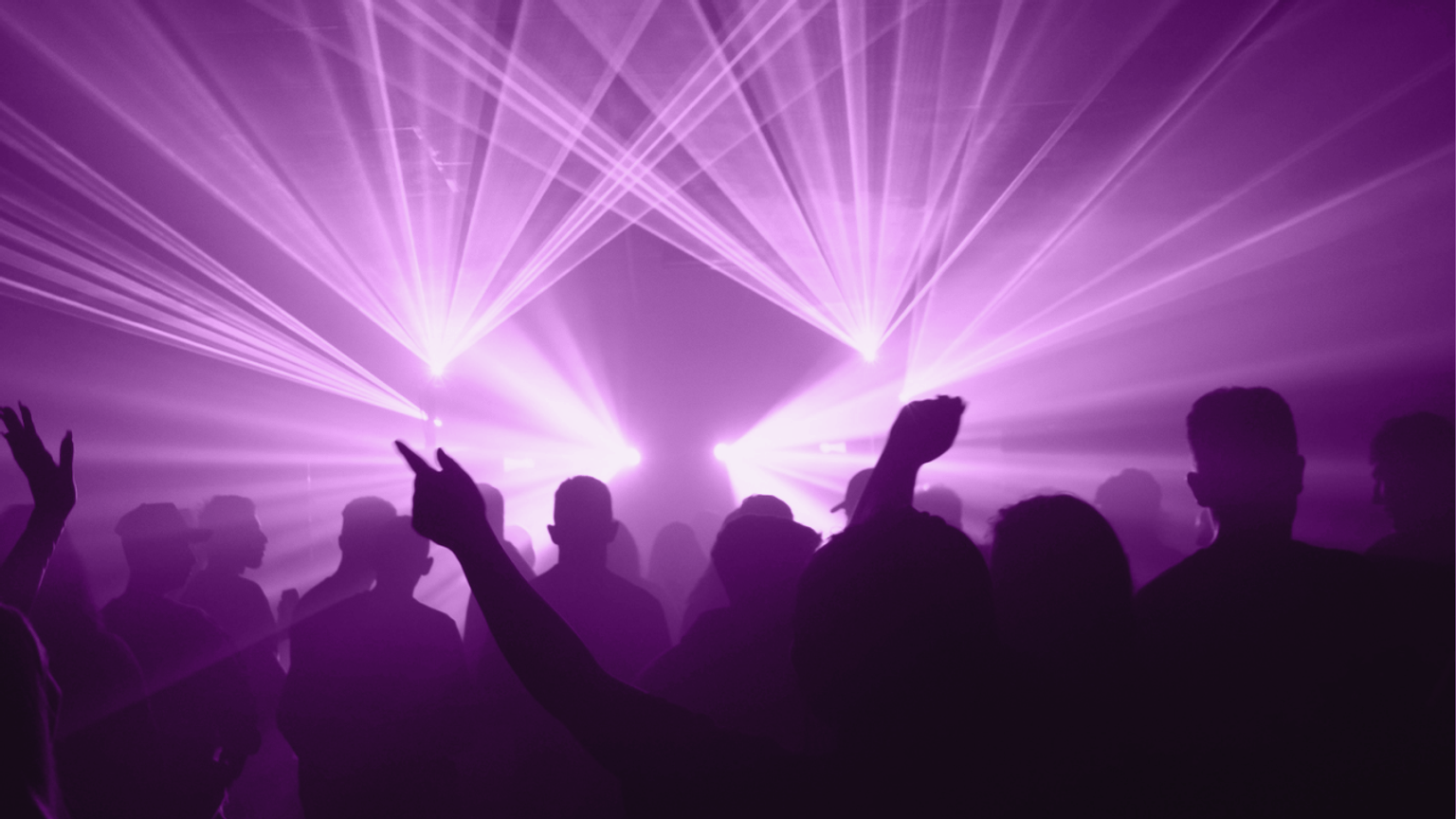 A group of people clubbing